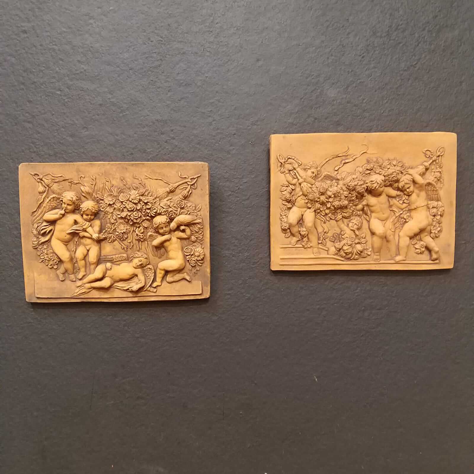 cherubs with roses wall plaques pair